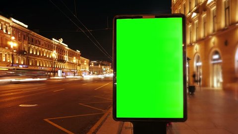  A Billboard with a Green Screen on a Busy  Street,Time Lapse.