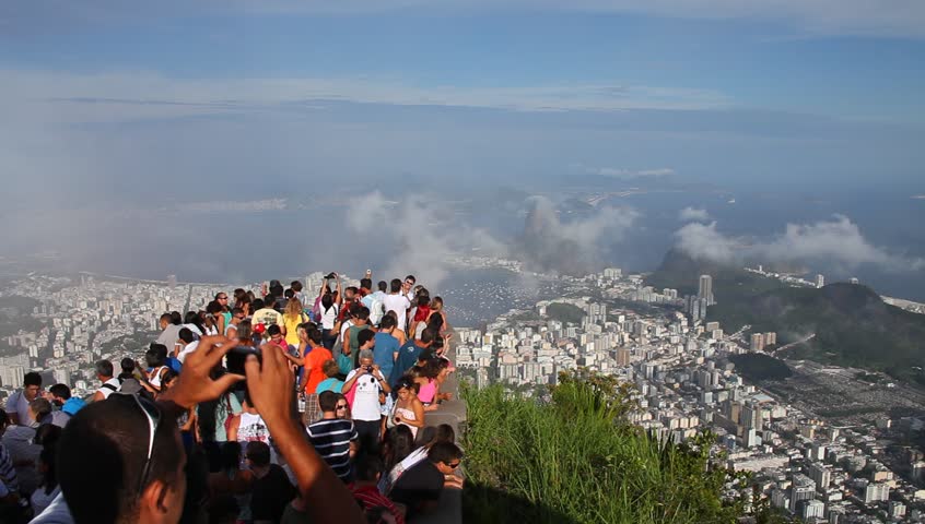 RIO DE JANEIRO - JANUARY 4: Tourists taking photographs from cliff overlooking