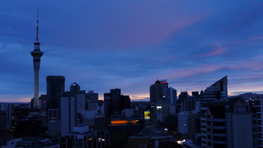 Panoramic view of Auckland skyline in sunrise morning dusk sky. 4K