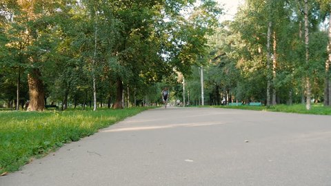 The man likes to run in the park, for a healthy lifestyle