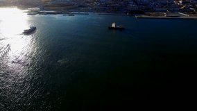 Portugal Lisbon city coast aerial view 4k video. Waterfront, ocean river port, boat ship sailing to marina dock pier