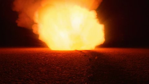 Gunpowder igniting and burning down path to close up explosion