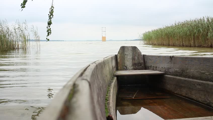 Wooden boat on the lake