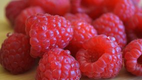 Fresh juicy raspberry closeup.
