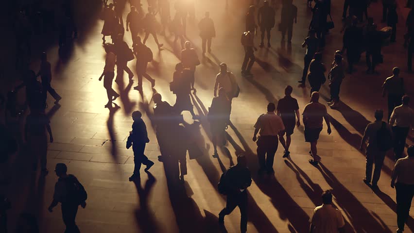 silhouette of unrecognizable people commuting in the city. crowded metropolis street scenery background    Royalty-Free Stock Footage #18809354