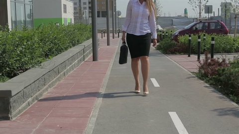 Business woman walking on the street