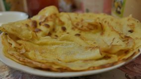 fried pancakes delicious on a plate slow motion video