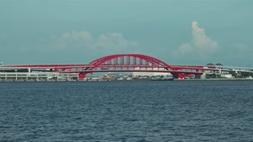 View of Kobe bay with highway traffic on the bridge. 4K resolution. 2016