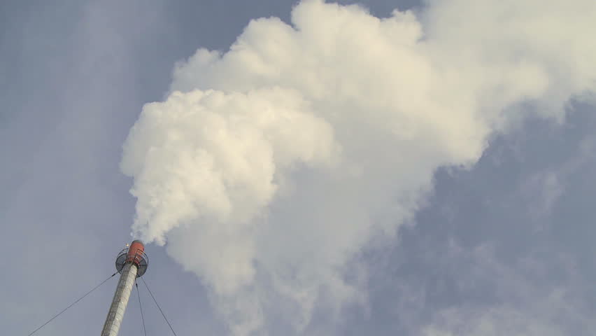 Smokestack of a gas processing refinery, time lapse