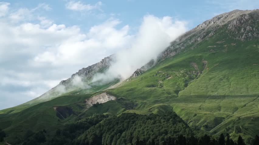 Boiling of Clouds Over the Mountain Pass. Timelapse