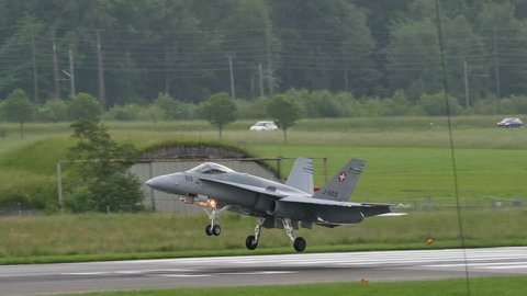 F 18 Hornet of Swiss Air Force Lands in Meiringen Airport. F 18 Hornet is a twin-engine supersonic, all-weather carrier-capable multirole combat jet. 4K UltraHD Video with original audio.