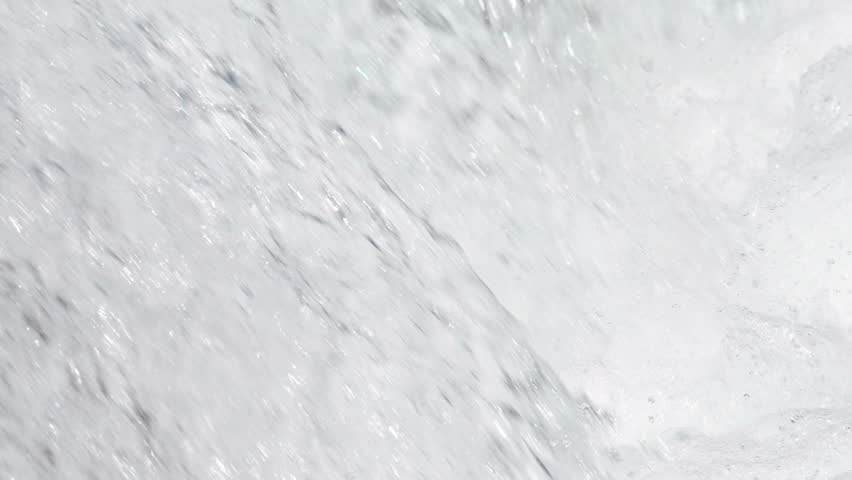 Hundreds of sockeye salmon leaping into the air to try and get over the waterfalls at Brooks Falls in Katmai National Park, Alaska