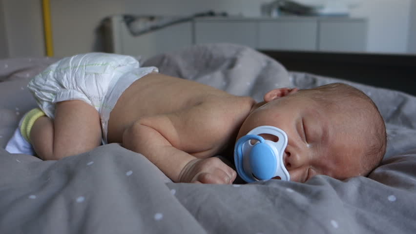 Newborn Sleepy Baby Sucks Pacifier Lying Stock Footage Video 100 Royalty Free 18854537 Shutterstock