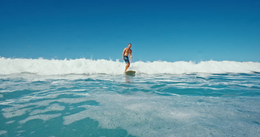 Young man having fun surfing | Shutterstock HD Video #18858971