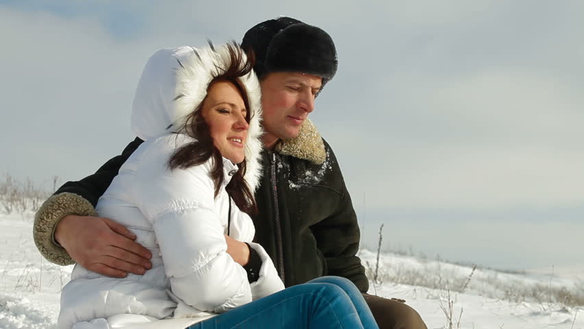 adult married couple enjoying a winter day