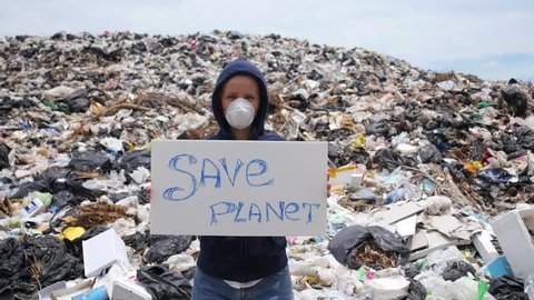 Pollution and Environmental Contamination - Woman on Disposal Site 스톡 비디오