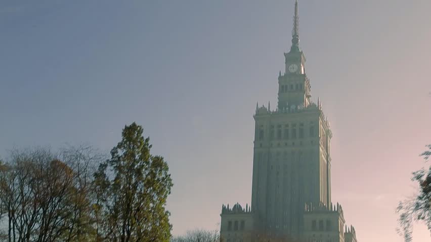 Driving by Palace of Culture and Science, Warsaw. Sunny day, Autumn. 