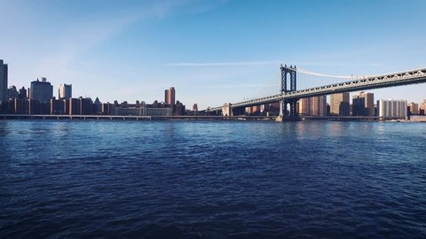 Manhattan bridge and beautiful sunny NYC