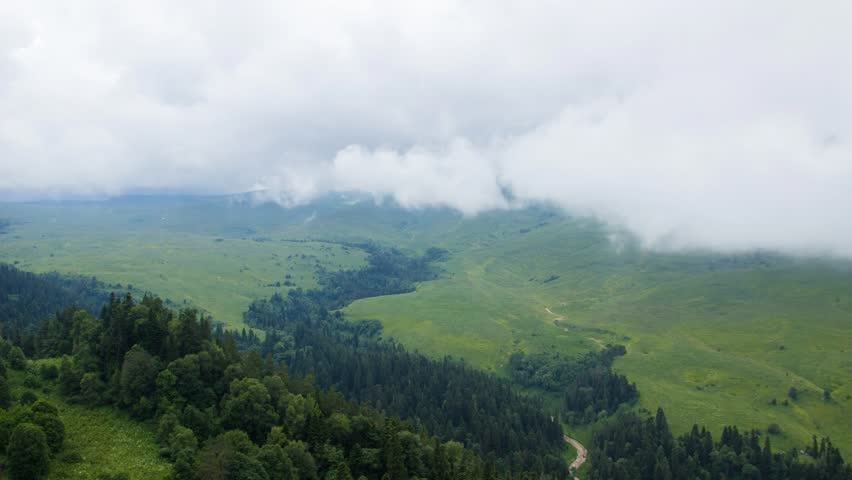 Clouds on meadows time lapse
