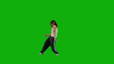 A girl dancing hip-hop against green screen 