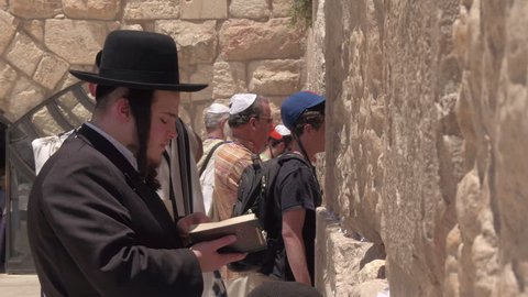 JERUSALEM, ISRAEL - 12 JUN 2016: pray at the Wailing Wall Jewish shrine in southern part of old city Jerusalem