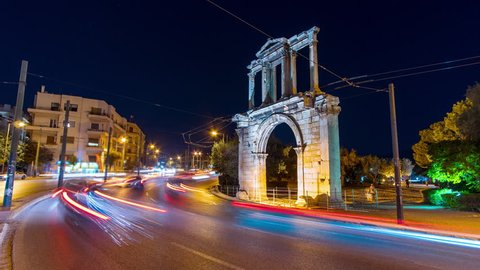 4K Athens, Gate of Hadrian monument, Roman ruins night timelapse.Night timelapse from downtown Athens Greece.The entrance that used to lead to the Temple of Zeus's archaeological site.