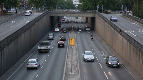 Dramatic shot of the dual carriageway through the city in England 
