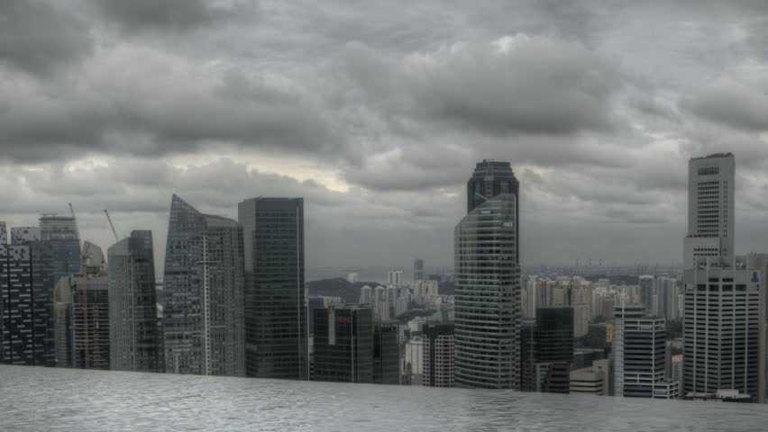 SINGAPORE - DEC 25 (Timelapse): Timelapse of Singapore Skyline behind a swimming