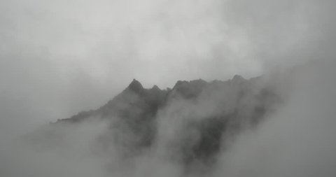 4k time lapse of mountain mist rising in the morning,fog pine trees,such as wonderland.Bomi County in tibet,the largest precipitation area in China.