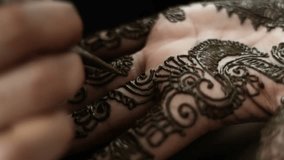 Close up on henna being applied