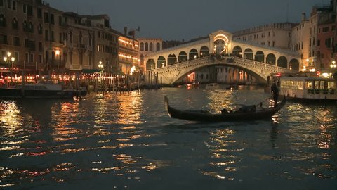 Gondola in front of Rialto Bridge on the Canale Grande in Venice, Italy