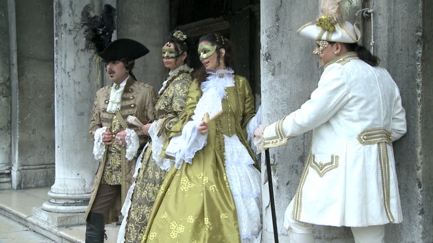 VENICE, ITALY - FEBRUARY 24: Disguised couples at Venice Carnival February 24,