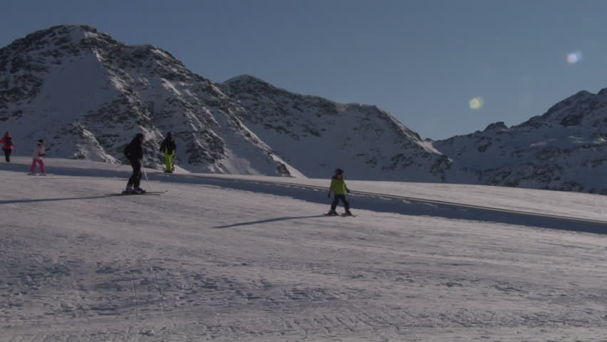 Winter, ski sun and fun - family in ski resort
