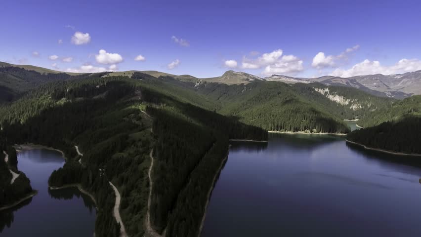 Fly Over Mirror Mountain Lake At Sunrise
