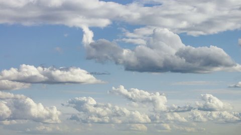 time-lapse of moving big clouds in the blue sky