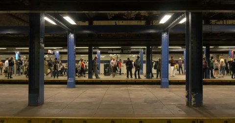 NEW YORK CITY - MAY 6, 2015: Train arriving in 59 st. subway station. The NYC Subway is one of the oldest and most extensive public transportation systems in the world, with 468 stations. 