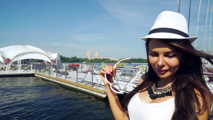 Woman in hat enjoying life and leisure, everyday successful women