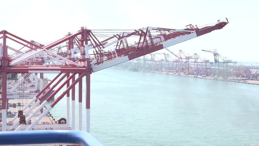 A oil tanker ship designed for the bulk transport of oil. The port of Kaohsiung, the largest harbor in Taiwan. 4K