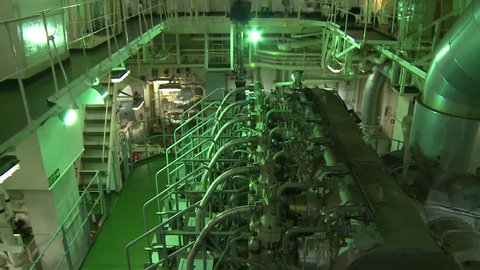 Engine room of a cargo ship. The engine room is the heart of the ship providing mechanical and electrical power for the entire ship.