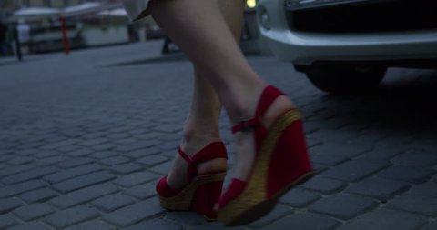 Sexy legs red high heels walking in city urban street - RED EPIC DRAGON 6K