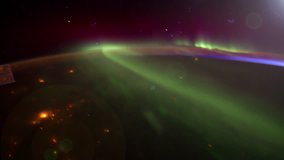 ISS Aurora Borealis over Eastern North America, Time Lapse 4K. Created from Public Domain images, courtesy of NASA JSC : http://eol.jsc.nasa.gov. Flare and subtle motion effect