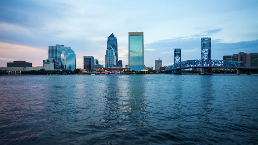 Day to Night Timelapse of Jacksonville, Florida city skyline over the St. John