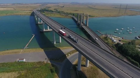 Dramatic 4K Drone footage of a modern transport bridge