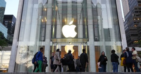NEW YORK - CIRCA MAY, 2015: Apple store entrance on 5th Avenue in Manhattan. As of 2014, Apple employs 72,800 permanent full-time employees, maintains 437 retail stores in fifteen countries.