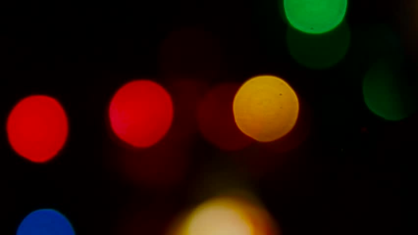 Bokeh produced by a the lights of a Christmas tree.