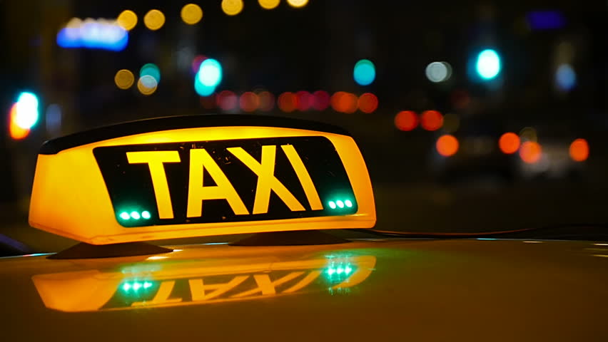 bright yellow taxi sign fixed on Stock Footage Video (100% Royalty-free ...