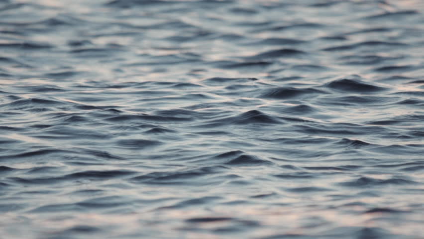 Calm tranquil sea surface telephoto 100p slowmotion.100fps shot of the surface of calm sea waves at almost eye level | Shutterstock HD Video #18989599