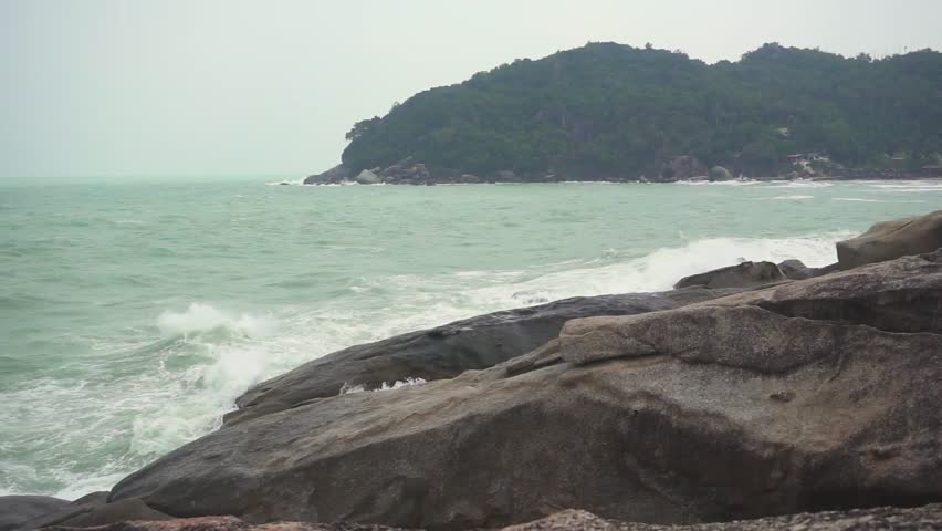 Stormy Sea Waves Crashing on the Rocks. Slow Motion