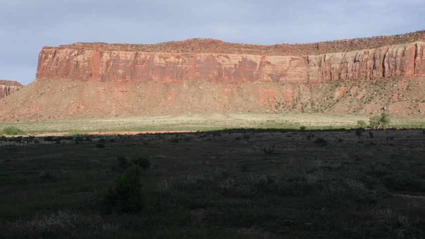 Aerial drone Moab Desert moving in the shadows