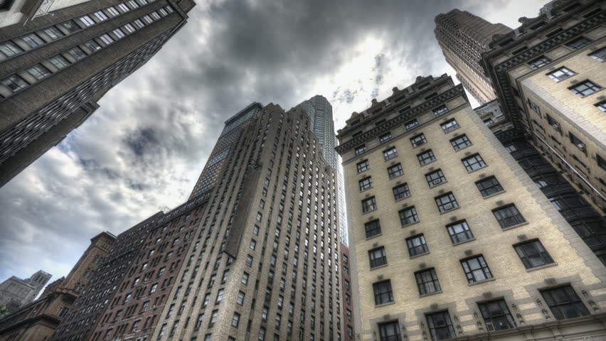 HDR Timelapse of Skyscraper in New York City with dark clouds passing by